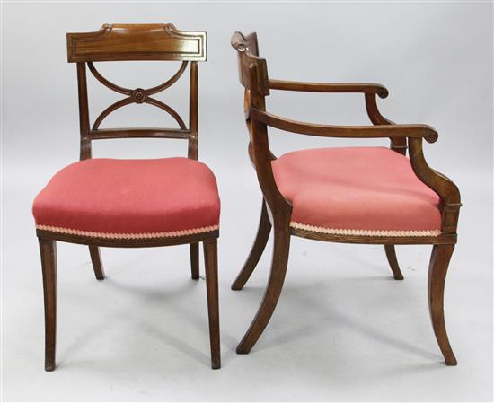 A set of fourteen Regency mahogany dining chairs,